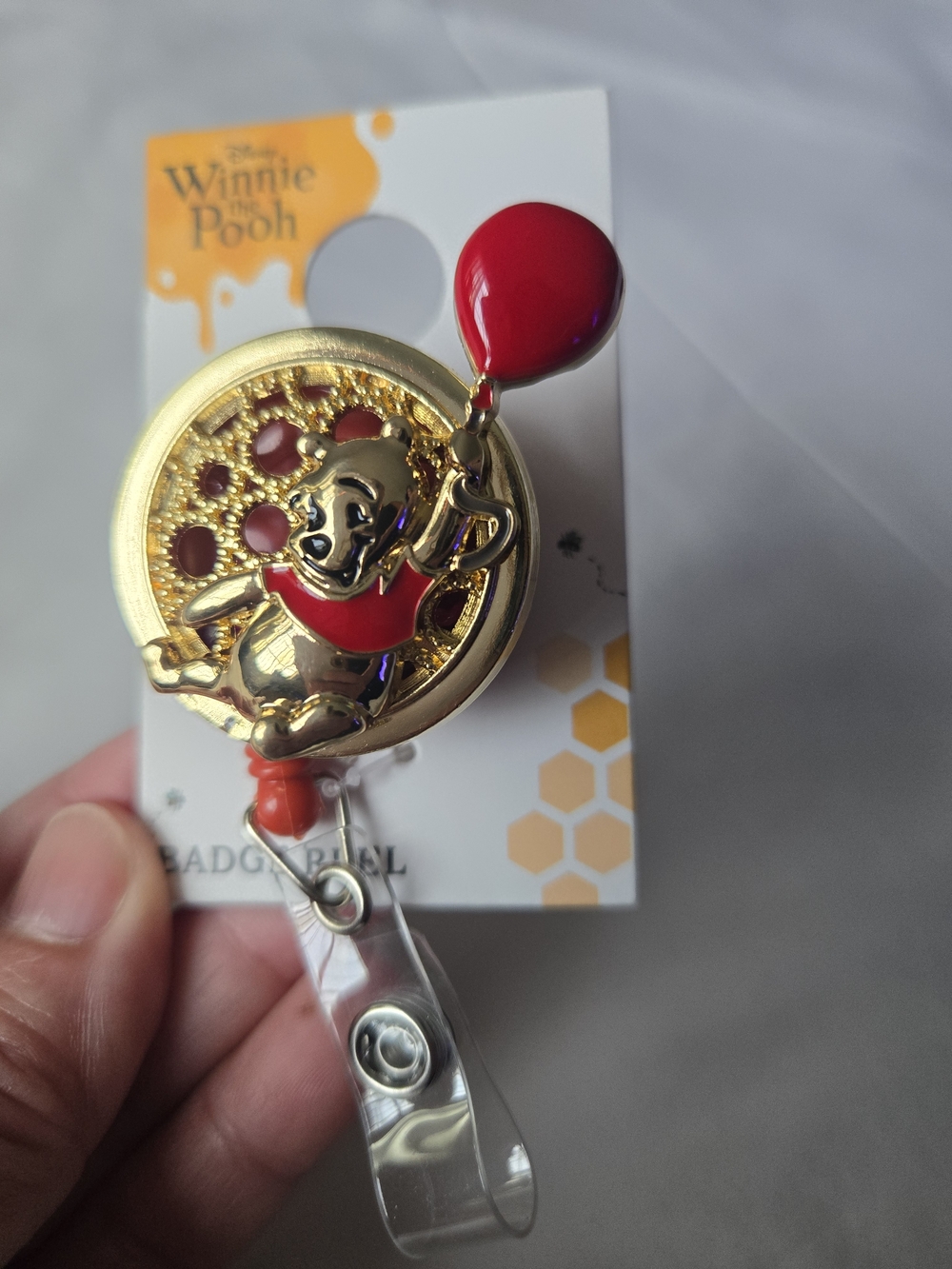 Disney Winnie the Pooh Gold Badge Reel with Red Balloon